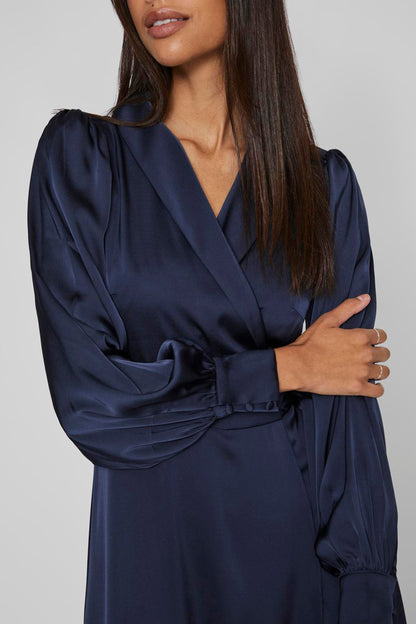 Lang Blauw Kleedje