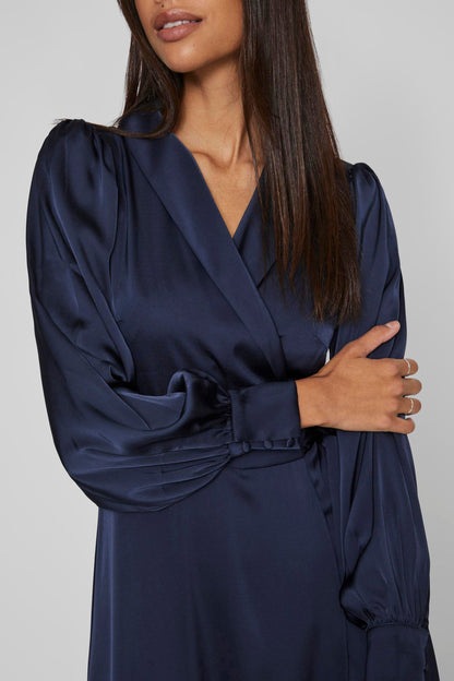 Lang Blauw Kleedje